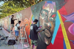 19 grafiters han pintat el mur del camp de futbol de Rafelbunyol en aquesta edició de ‘Rafelbunyol Final de Trajecte’